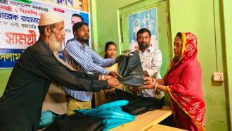 শারদীয় দুর্গাপূজা উপলক্ষে একশত পরিবারের মাঝে লামায় উপহারসামগ্রী বিতরণ